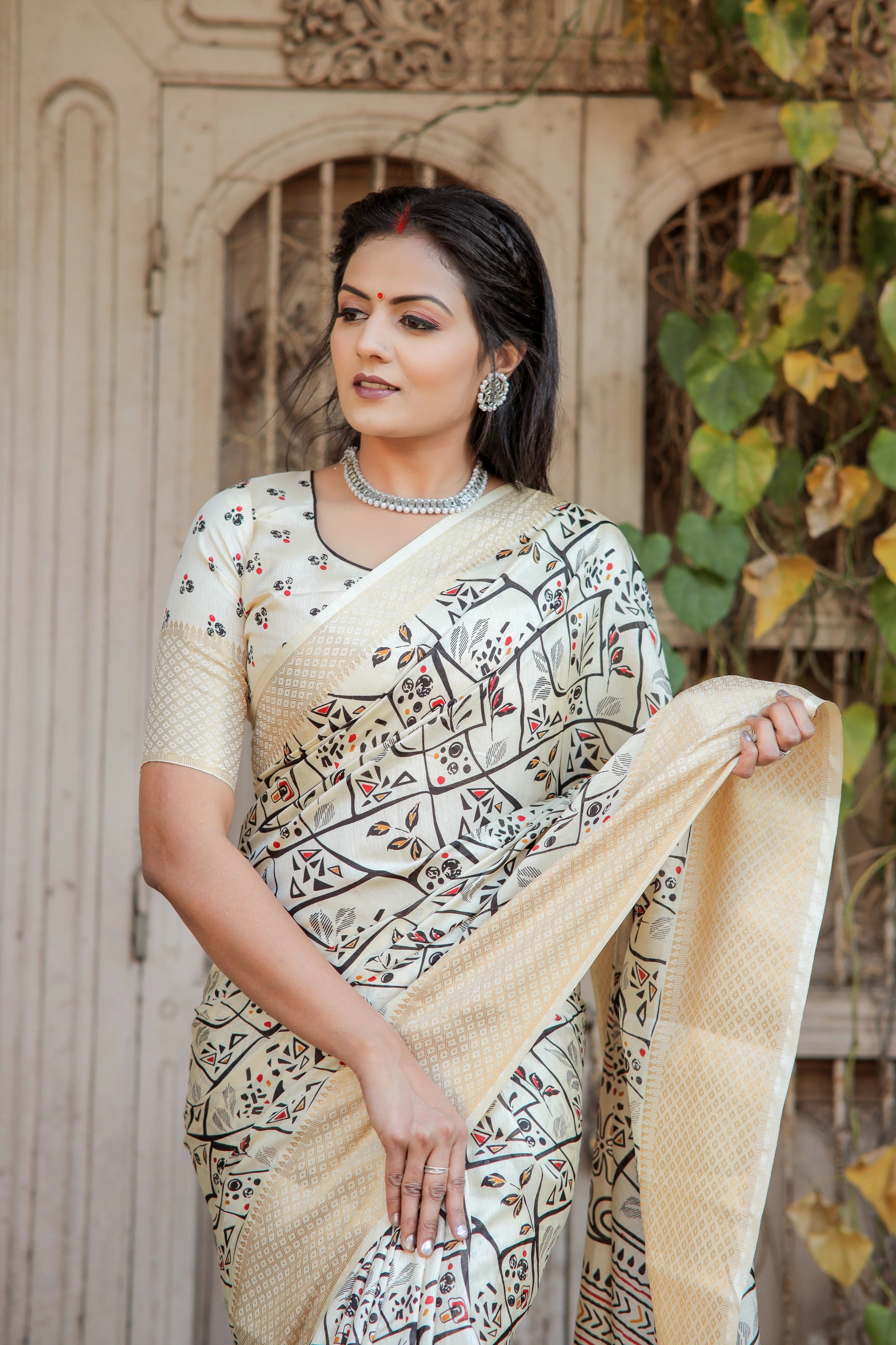 Vibrant Cream Dola Silk Saree