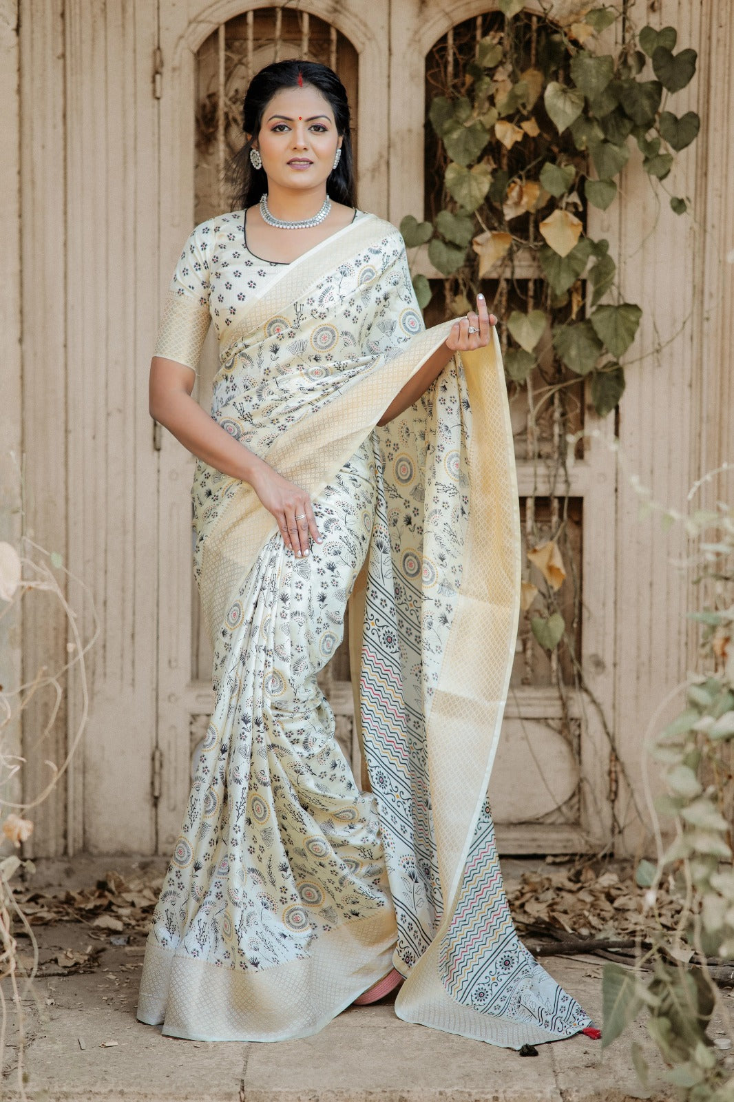 Vibrant Cream Dola Silk Saree